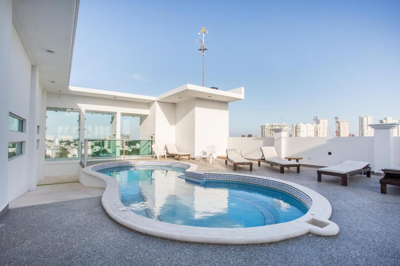 Capital O Cancun Ocean View, كانكون المظهر الخارجي الصورة Rooftop pool
