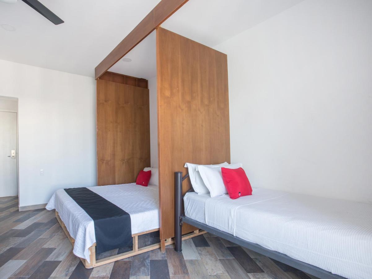 Capital O Cancun Ocean View, كانكون المظهر الخارجي الصورة A room at the hotel
